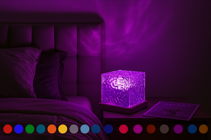 Ocean wave projector cube illuminating a bedroom with purple ambient lighting.