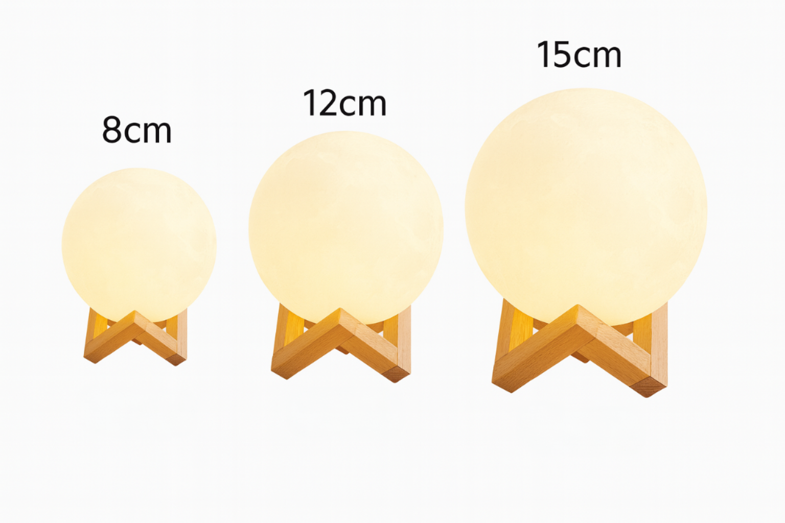 Moon lamp size chart showing 8cm 12cm and 15cm options on wooden stands